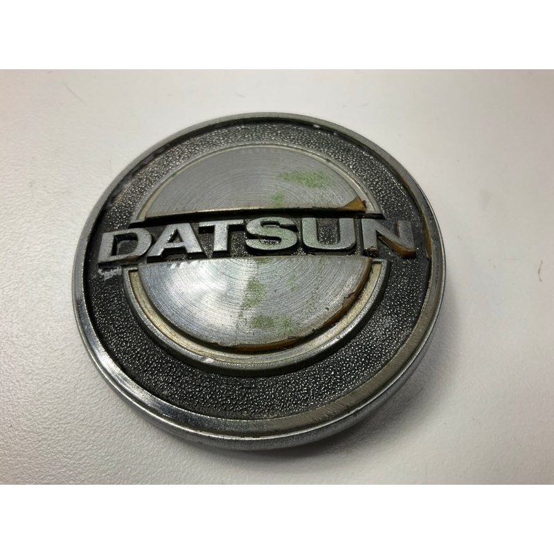 USED, One Mounting Tab Broken, Original OEM Hood Emblem For 1970-73 Datsun 240z