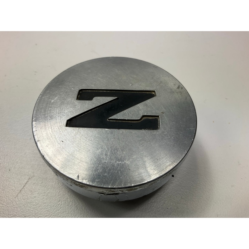 USED, ONE Mounting Tab Broken - Wheel Center Cap OEM For 84-86 Nissan 300zx Z31