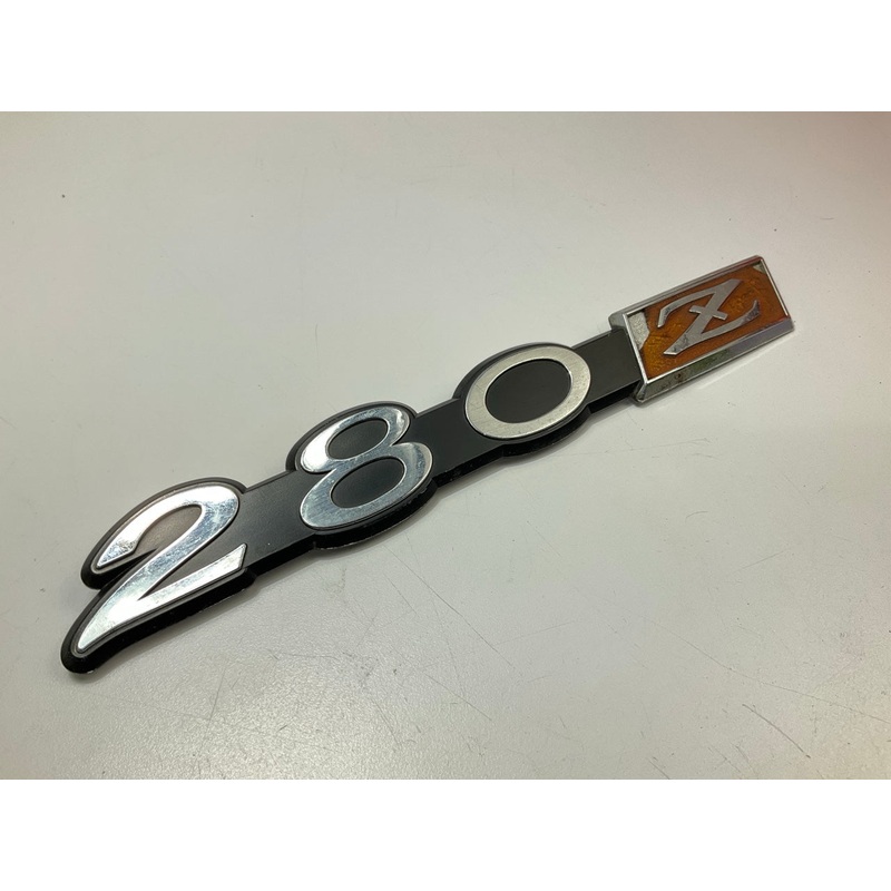 USED #571 - Side Fender Emblem OEM For 1975-1978 Datsun 280z