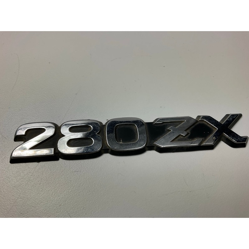 USED - Fender Emblem Badge Decal OEM For 1979-1983 Datsun 280zx