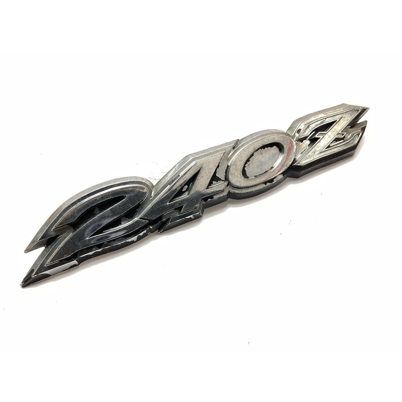 USED # 506 - Rear Hatch ''240z'' Emblem OEM For 70-73 Datsun 240z